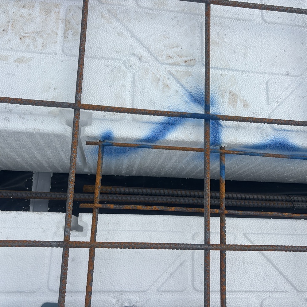 Insufficient concrete cover to the reinforcement, found during a slab pre-pour inspection in Mickleham
